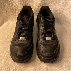 Air Force 1s. All black youth 5.5.
